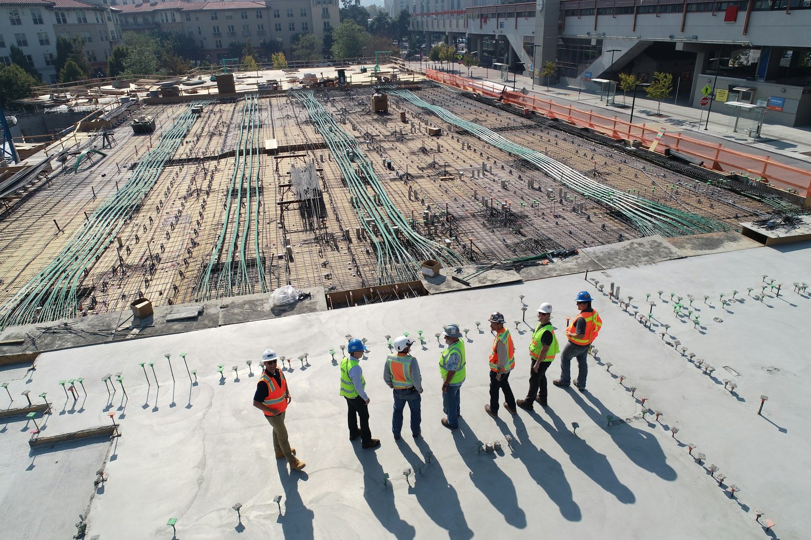 Construction site with cranes and concrete structures
